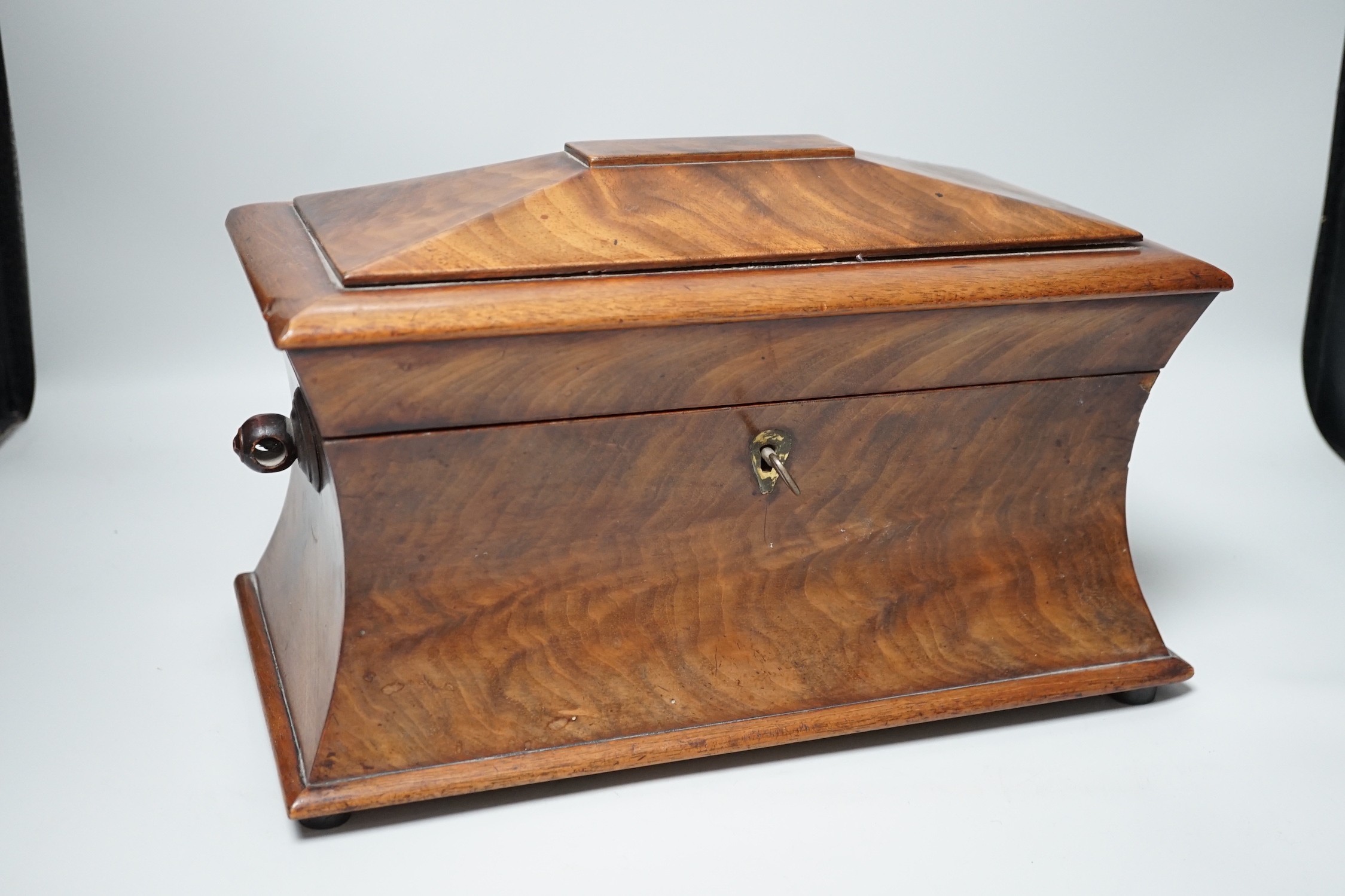 A 19th century mahogany sarcophagus shaped tea caddy, 34cm wide